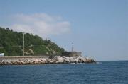 Faro de San Antón desde la bocana del puerto